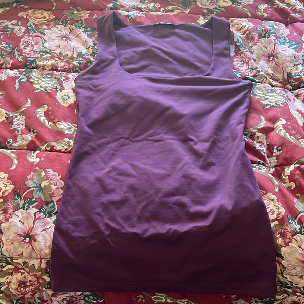 Sleeveless basic. Maroon/ purplish color.